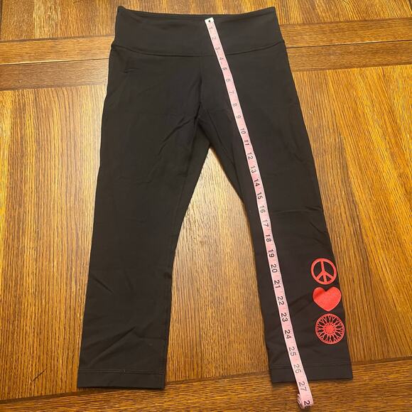 Lululemon Soulcycle Skull Heart Wunder Under Crop Leggings Sz 4 - Picture 11 of 12